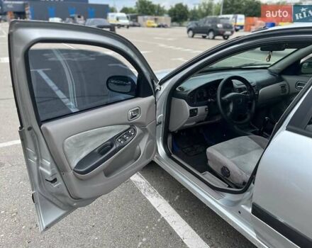 Серый Ниссан Альмера, объемом двигателя 1.8 л и пробегом 372 тыс. км за 2600 $, фото 6 на Automoto.ua