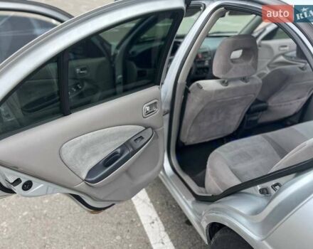 Серый Ниссан Альмера, объемом двигателя 1.8 л и пробегом 372 тыс. км за 2600 $, фото 13 на Automoto.ua