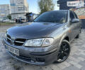 Серый Ниссан Альмера, объемом двигателя 1.6 л и пробегом 200 тыс. км за 3800 $, фото 1 на Automoto.ua