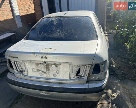 Серый Ниссан Альмера, объемом двигателя 1.5 л и пробегом 240 тыс. км за 1700 $, фото 1 на Automoto.ua