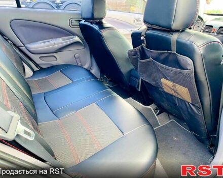 Серый Ниссан Альмера, объемом двигателя 1.5 л и пробегом 254 тыс. км за 4200 $, фото 4 на Automoto.ua