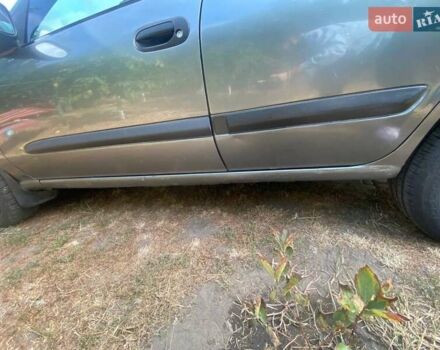 Серый Ниссан Альмера, объемом двигателя 1.5 л и пробегом 227 тыс. км за 2800 $, фото 4 на Automoto.ua