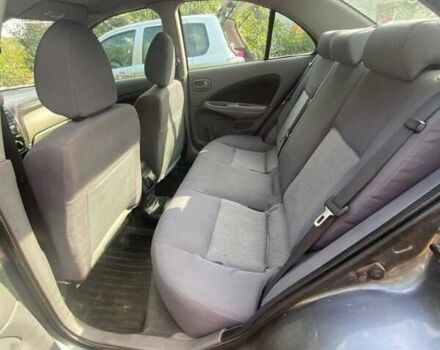 Серый Ниссан Альмера, объемом двигателя 1.5 л и пробегом 227 тыс. км за 2800 $, фото 5 на Automoto.ua