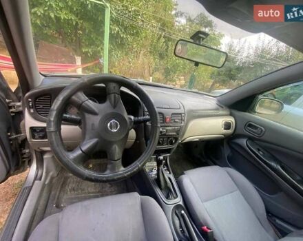 Серый Ниссан Альмера, объемом двигателя 1.5 л и пробегом 227 тыс. км за 2800 $, фото 6 на Automoto.ua