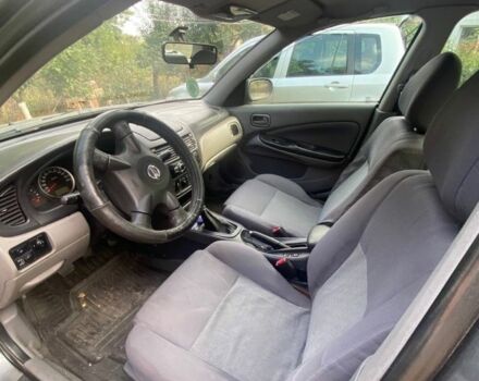 Серый Ниссан Альмера, объемом двигателя 1.5 л и пробегом 227 тыс. км за 2800 $, фото 4 на Automoto.ua