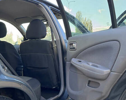 Серый Ниссан Альмера, объемом двигателя 1.8 л и пробегом 181 тыс. км за 4400 $, фото 12 на Automoto.ua