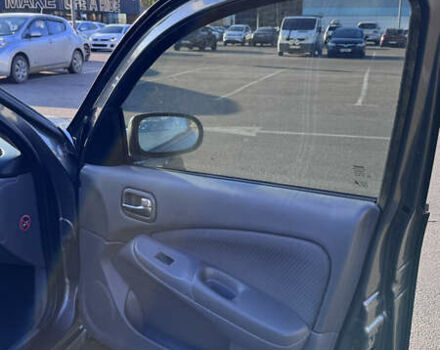 Серый Ниссан Альмера, объемом двигателя 1.8 л и пробегом 181 тыс. км за 4400 $, фото 10 на Automoto.ua