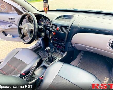 Серый Ниссан Альмера, объемом двигателя 1.5 л и пробегом 254 тыс. км за 4200 $, фото 2 на Automoto.ua