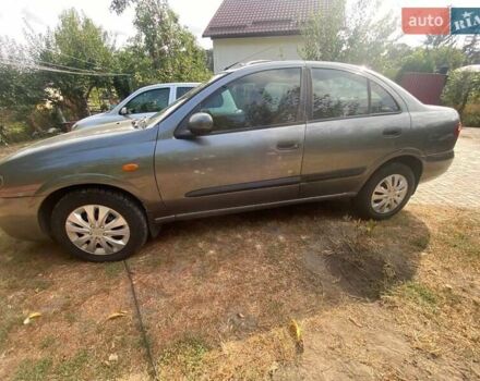 Серый Ниссан Альмера, объемом двигателя 1.5 л и пробегом 227 тыс. км за 2800 $, фото 2 на Automoto.ua