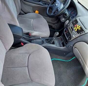 Серый Ниссан Альмера, объемом двигателя 1.5 л и пробегом 253 тыс. км за 2200 $, фото 26 на Automoto.ua