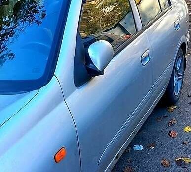 Серый Ниссан Альмера, объемом двигателя 1.8 л и пробегом 280 тыс. км за 3001 $, фото 2 на Automoto.ua