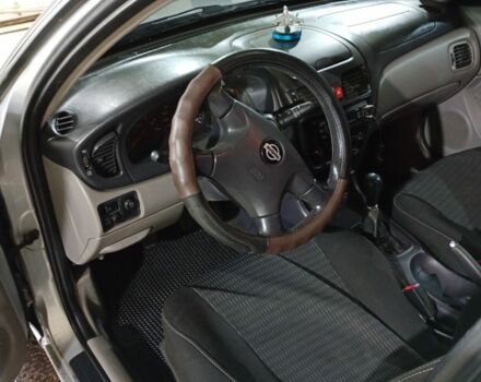 Серый Ниссан Альмера, объемом двигателя 1.5 л и пробегом 300 тыс. км за 2700 $, фото 7 на Automoto.ua