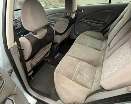 Серый Ниссан Альмера, объемом двигателя 2.2 л и пробегом 260 тыс. км за 1300 $, фото 2 на Automoto.ua