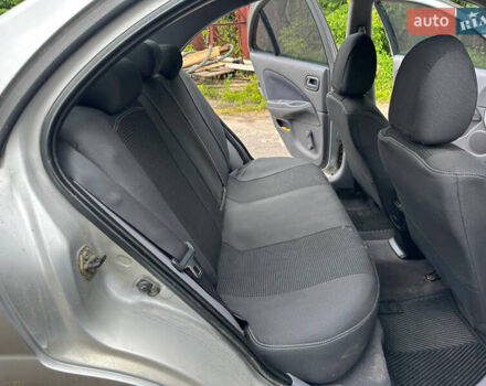 Серый Ниссан Альмера, объемом двигателя 1.5 л и пробегом 303 тыс. км за 2499 $, фото 16 на Automoto.ua
