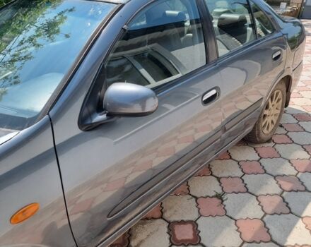 Серый Ниссан Альмера, объемом двигателя 1.5 л и пробегом 400 тыс. км за 3400 $, фото 2 на Automoto.ua