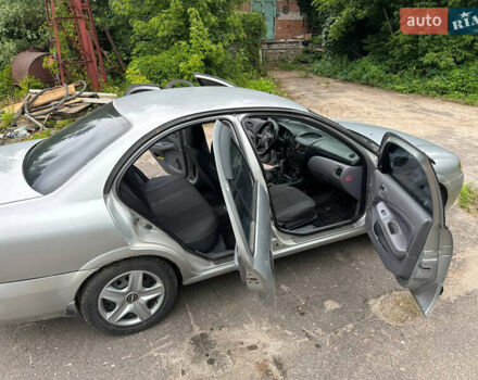 Серый Ниссан Альмера, объемом двигателя 1.5 л и пробегом 303 тыс. км за 2350 $, фото 9 на Automoto.ua