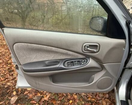 Серый Ниссан Альмера, объемом двигателя 2.2 л и пробегом 260 тыс. км за 1300 $, фото 3 на Automoto.ua