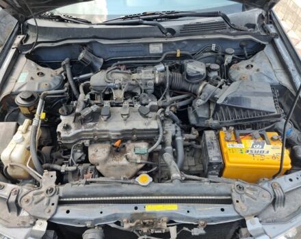 Серый Ниссан Альмера, объемом двигателя 1.5 л и пробегом 400 тыс. км за 3400 $, фото 7 на Automoto.ua