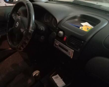 Серый Ниссан Альмера, объемом двигателя 1.8 л и пробегом 120 тыс. км за 3800 $, фото 3 на Automoto.ua