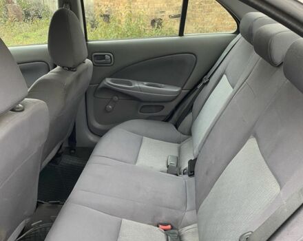 Серый Ниссан Альмера, объемом двигателя 1.5 л и пробегом 181 тыс. км за 2850 $, фото 12 на Automoto.ua