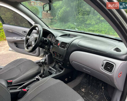 Серый Ниссан Альмера, объемом двигателя 1.5 л и пробегом 303 тыс. км за 2499 $, фото 11 на Automoto.ua