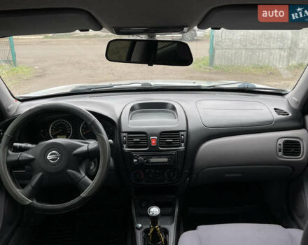 Сірий Ніссан Альмера, об'ємом двигуна 1.5 л та пробігом 302 тис. км за 2900 $, фото 6 на Automoto.ua