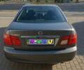 Серый Ниссан Альмера, объемом двигателя 1.5 л и пробегом 325 тыс. км за 3500 $, фото 5 на Automoto.ua