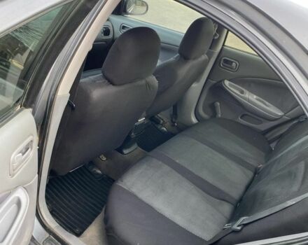 Серый Ниссан Альмера, объемом двигателя 1.5 л и пробегом 265 тыс. км за 2600 $, фото 6 на Automoto.ua