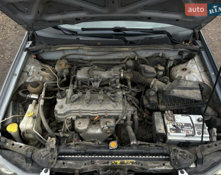 Сірий Ніссан Альмера, об'ємом двигуна 1.5 л та пробігом 302 тис. км за 2900 $, фото 14 на Automoto.ua
