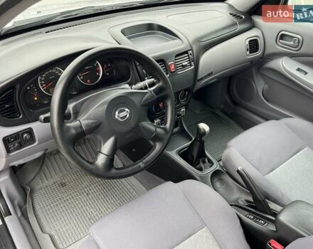 Серый Ниссан Альмера, объемом двигателя 1.5 л и пробегом 140 тыс. км за 4600 $, фото 25 на Automoto.ua