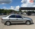 Серый Ниссан Альмера, объемом двигателя 1.5 л и пробегом 210 тыс. км за 3200 $, фото 5 на Automoto.ua