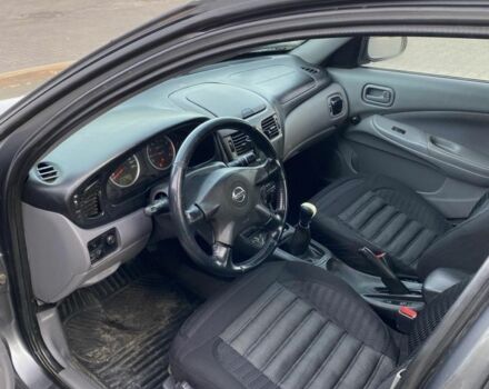 Серый Ниссан Альмера, объемом двигателя 1.5 л и пробегом 265 тыс. км за 2600 $, фото 7 на Automoto.ua