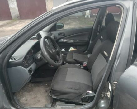 Серый Ниссан Альмера, объемом двигателя 1.5 л и пробегом 200 тыс. км за 4500 $, фото 6 на Automoto.ua