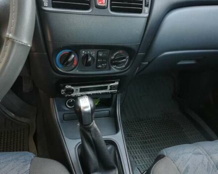 Серый Ниссан Альмера, объемом двигателя 1.5 л и пробегом 180 тыс. км за 4000 $, фото 21 на Automoto.ua