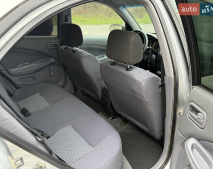 Серый Ниссан Альмера, объемом двигателя 1.5 л и пробегом 204 тыс. км за 3350 $, фото 7 на Automoto.ua