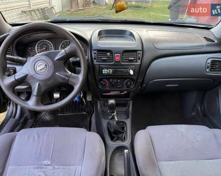 Сірий Ніссан Альмера, об'ємом двигуна 1.5 л та пробігом 352 тис. км за 3600 $, фото 9 на Automoto.ua