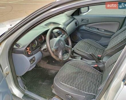 Серый Ниссан Альмера, объемом двигателя 1.6 л и пробегом 302 тыс. км за 2400 $, фото 16 на Automoto.ua