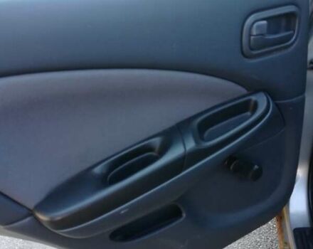 Серый Ниссан Альмера, объемом двигателя 1.5 л и пробегом 180 тыс. км за 4000 $, фото 6 на Automoto.ua