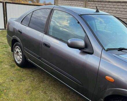 Сірий Ніссан Альмера, об'ємом двигуна 1.5 л та пробігом 352 тис. км за 3600 $, фото 6 на Automoto.ua