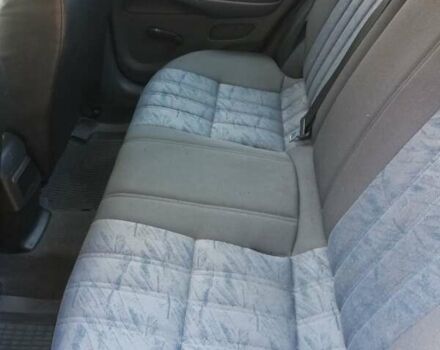 Серый Ниссан Альмера, объемом двигателя 1.5 л и пробегом 180 тыс. км за 4000 $, фото 11 на Automoto.ua