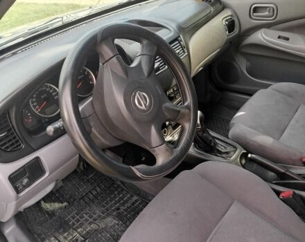 Серый Ниссан Альмера, объемом двигателя 1.5 л и пробегом 202 тыс. км за 2499 $, фото 6 на Automoto.ua