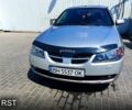 Серый Ниссан Альмера, объемом двигателя 1.5 л и пробегом 324 тыс. км за 3300 $, фото 1 на Automoto.ua