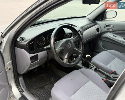 Серый Ниссан Альмера, объемом двигателя 1.5 л и пробегом 204 тыс. км за 3350 $, фото 5 на Automoto.ua