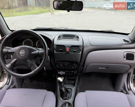 Серый Ниссан Альмера, объемом двигателя 1.5 л и пробегом 204 тыс. км за 3350 $, фото 9 на Automoto.ua