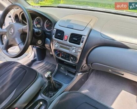 Сірий Ніссан Альмера, об'ємом двигуна 1.5 л та пробігом 286 тис. км за 4000 $, фото 8 на Automoto.ua