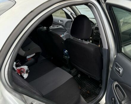 Серый Ниссан Альмера, объемом двигателя 1.5 л и пробегом 540 тыс. км за 3600 $, фото 2 на Automoto.ua