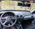 Серый Ниссан Альмера, объемом двигателя 1.5 л и пробегом 300 тыс. км за 3999 $, фото 14 на Automoto.ua