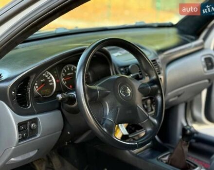 Серый Ниссан Альмера, объемом двигателя 1.5 л и пробегом 310 тыс. км за 3200 $, фото 2 на Automoto.ua