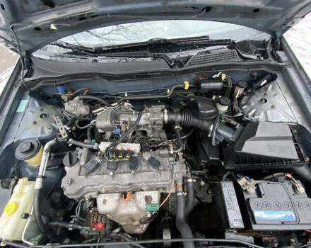 Серый Ниссан Альмера, объемом двигателя 1.5 л и пробегом 265 тыс. км за 1800 $, фото 9 на Automoto.ua