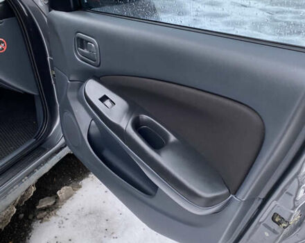 Серый Ниссан Альмера, объемом двигателя 1.5 л и пробегом 265 тыс. км за 1800 $, фото 4 на Automoto.ua